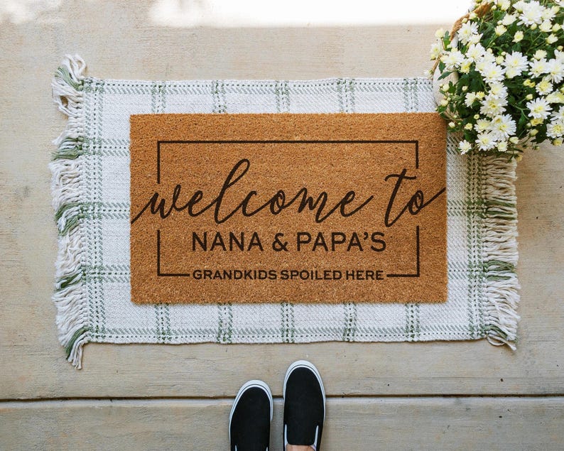 custom grandparents doormat that says welcome to nana and papa's house. Grandkids spoiled here