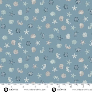 May include: Blue fabric featuring a repeating pattern of seashells, starfish, and seahorses in white, tan, and navy. The design has a nautical theme, suitable for coastal-themed projects.