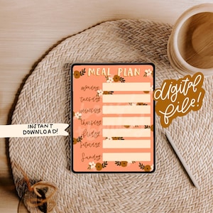 May include: A digital printable meal planner with a peach background and floral illustrations. The planner has spaces to write in meals for each day of the week, Monday through Sunday. The text "INSTANT DOWNLOAD!" and "digital file!" are also included in the image.