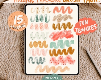 May include: A digital tablet screen displaying a set of 15 Procreate brush packs. The brushes are displayed in rows and feature a variety of fun textures, including stars, waves, and glitter. The text "Artistic Procreate BRUSH PACK!" and "FUN Textures" is displayed on the screen. The text "INSTANT DOWNLOAD!" is displayed at the bottom of the screen.