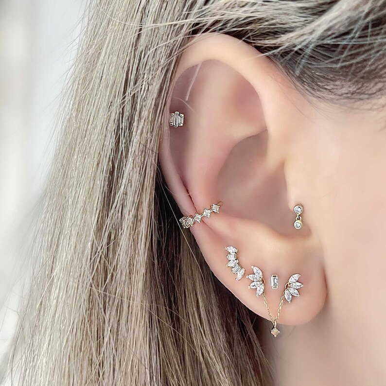 Woman Wearing Floating 14k & Opal Chain Stud Earring Charm in Double Piercing