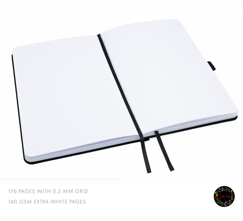 May include: A black notebook with a dotted grid and a black ribbon bookmark. The notebook has 176 pages with 0.5 mm grid and 160 gsm extra white pages.