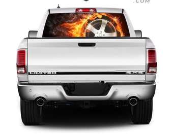 May include: A white pickup truck with a black "LIMITED" and "4x4" emblem on the tailgate. The rear window has a graphic of a tire engulfed in flames.