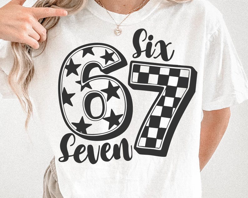 May include: White t-shirt with the numbers "67" in a black, bold font. The number "6" is filled with stars, and the number "7" has a checkered pattern. The words "Six" and "Seven" are written above and below the numbers.