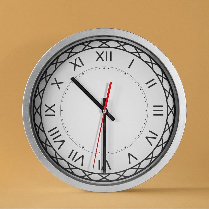 May include: A silver round clock with black Roman numeral markings and black hands. The clock face is white with a red second hand.