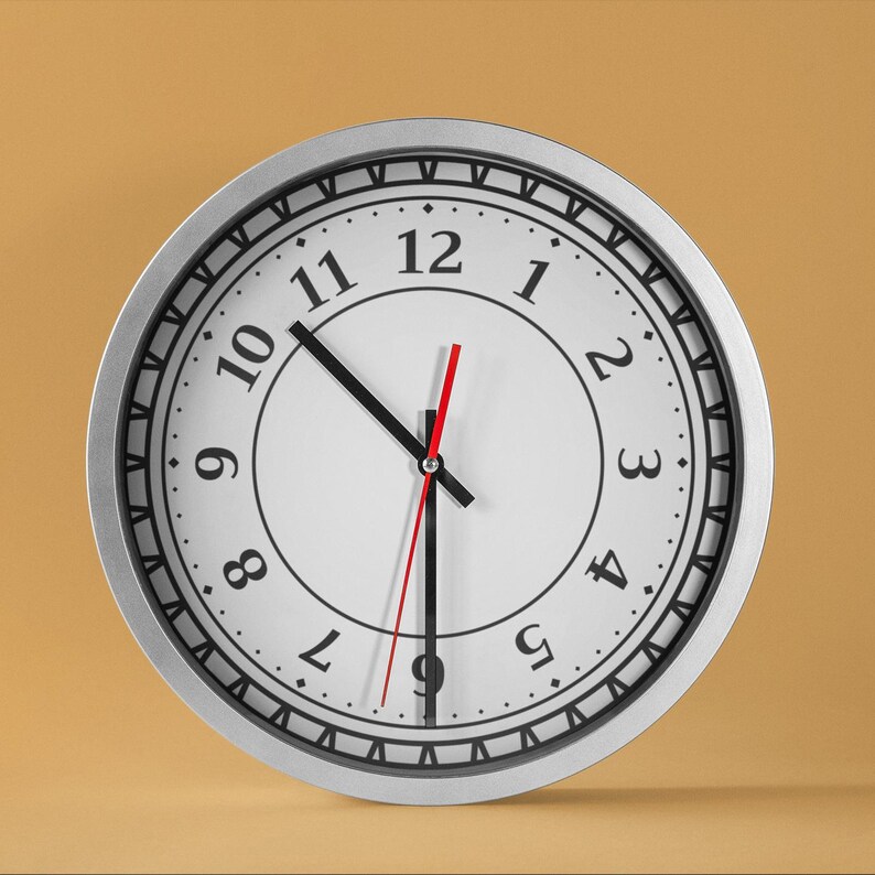 May include: A silver clock with black Roman numeral markings and black hands on a white face. The clock has a red second hand.