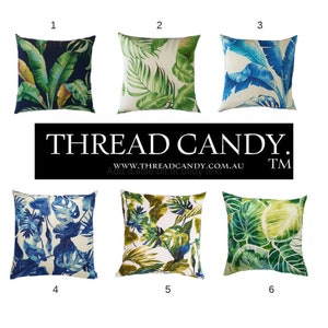 May include: Six different tropical leaf patterned throw pillow covers. The pillows are all square and have a white background. The patterns are in shades of green, blue, and yellow. The pillows are numbered 1 through 6.