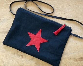 Black shoulder bag with red leather star