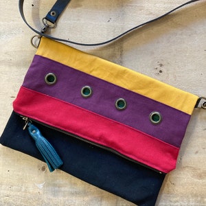 Small striped shoulder bag in black, red, plum, mustard and fir green