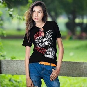 May include: A black t-shirt with a white graphic of a drone and the text "Drone Pilot" in red.