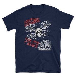 May include: Navy blue t-shirt with a red graphic of a drone and the text "Drone Pilot".