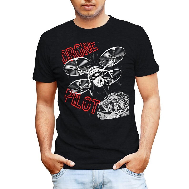 May include: A black t-shirt with a white graphic of a drone and the text "Drone Pilot" in red.