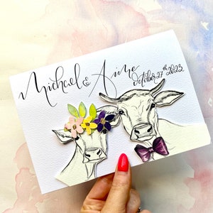 cow wedding card with names and wedding date