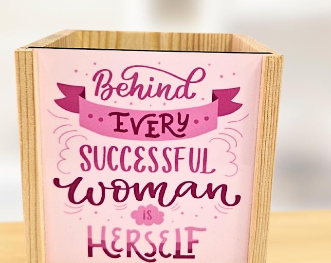 Pink background with small reading  - personalised pen pot - crafted from spruce pine - a stylish desk touch - vibrant colours