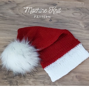 May include: Red and white knitted Santa hat with a white faux fur pom pom. Machine Knit Pattern.