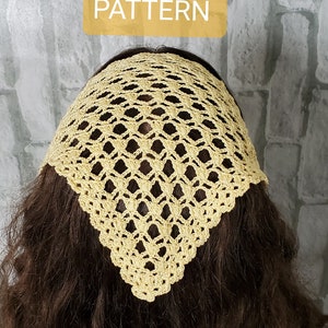 May include: A crocheted headband in a light yellow color. The headband is a square shape with a delicate pattern. The headband is worn on a person with long brown hair.