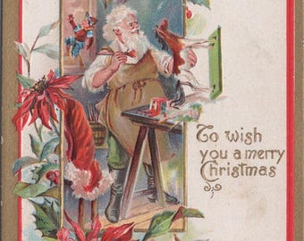 Antique Embossed Christmas Postcard – Santa Painting Toys (Divided Back Era)
