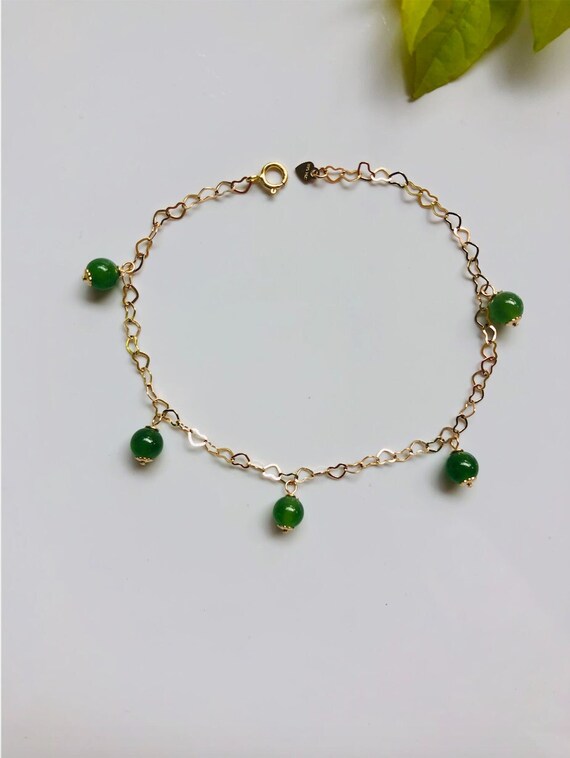 Jade bead bracelet with on sale gold