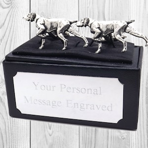 May include: A pair of silver cufflinks in the shape of two German Shorthaired Pointers running, presented in a black gift box with a silver plaque that reads "Your Personal Message Engraved".