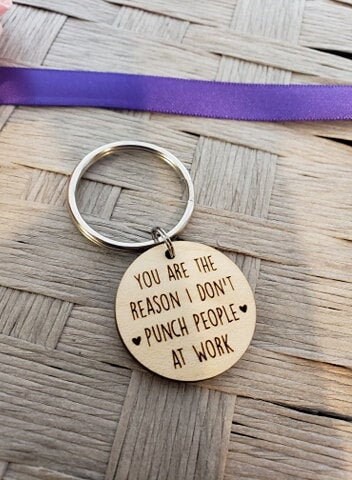 You are the reason I don't punch people at work keychain, friend …