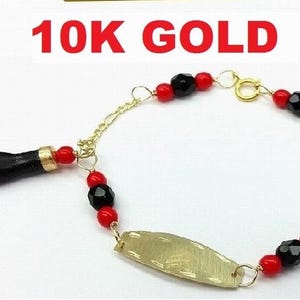 New 10K Gold Azabache Baby Bracelet (Evil Eye Protection) Pulsera Mano de Azabache Bebe De Oro Para Mal De Ojo. 10K Solid Gold Azabache Bracelet for newborn babies to protect them from the evil eye.
Also called "Mano de Azabache"
