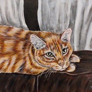 May include: A painting of a tabby cat with orange and brown fur, lying on a brown surface with its head resting on its paws. The cat has green eyes and white fur on its ears. The background is a white curtain.
