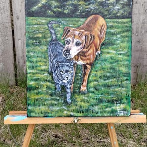May include: A painting on canvas of a brown dog and a gray cat standing in a green grassy field. The dog is looking at the cat, and the cat is looking at the viewer. The painting is signed "Vale Jerry 2023".