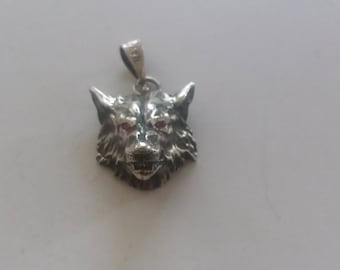Sterling silver wolf Pendant with rubi