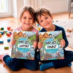 May include: Two children holding illustrated children's books titled Wo ist Lotta? and Wo ist Finn? The books feature colorful drawings of global landmarks, including pyramids and mountains, with a central circular graphic and cartoon characters.