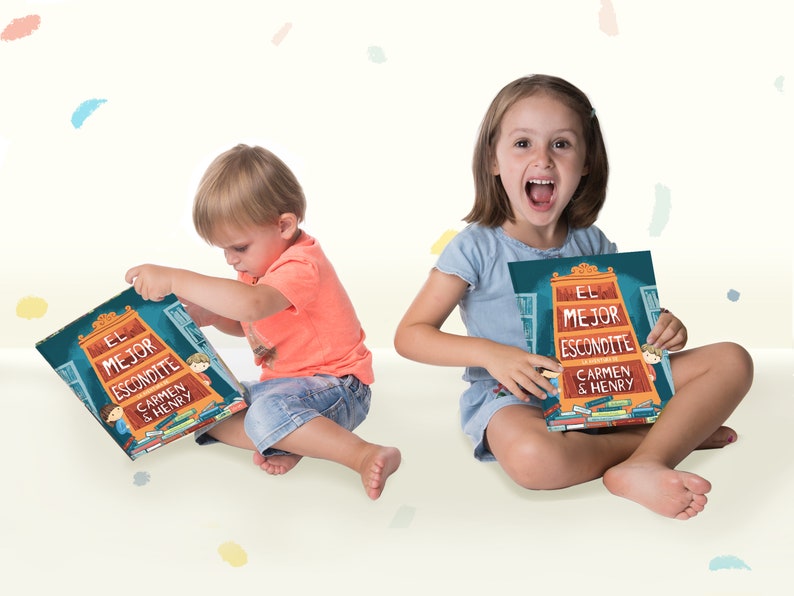 May include: A children's picture book titled El Mejor Escondite, featuring an illustration of a large wooden bookshelf filled with books on the cover, with the text Carmen & Henry displayed prominently in white and orange lettering.