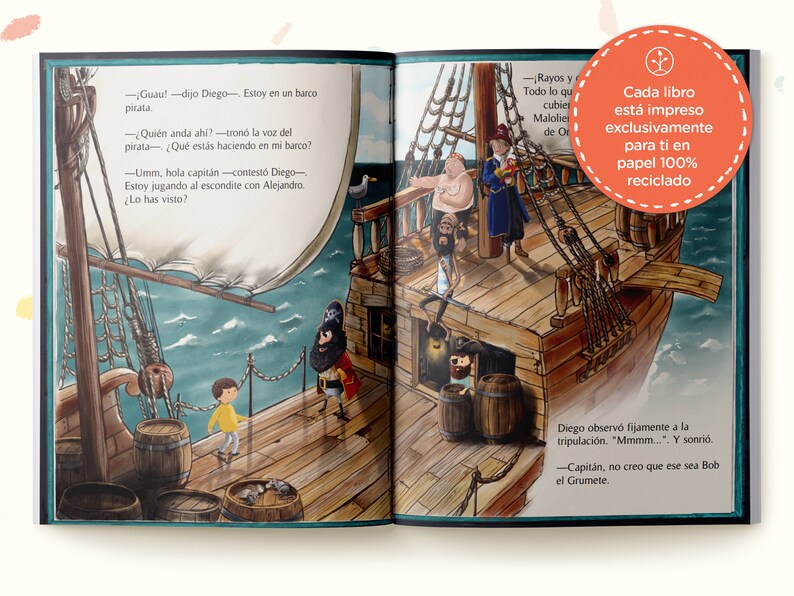 May include: An open children's storybook featuring a colorful illustration of a wooden pirate ship on the ocean. The scene depicts a child in a yellow shirt interacting with a pirate captain and crew. Text in Spanish is printed on the pages.