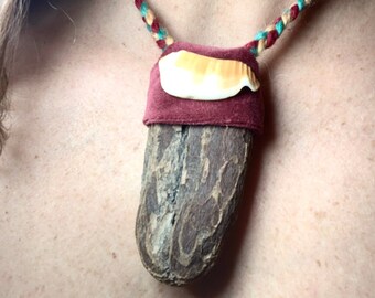 Wood talisman with shell wrapped in velvet, braided yarn, looks like a pouch, can be worn short or long.