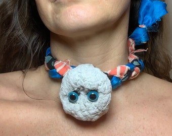 Hand made recycled paper sphere creature, odd one of a kind necklace with braided fabric.