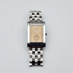 Longines Dolce Vita Tank Watch, Quartz, Champagne/Peach Face, Stainless Steel, Swiss-Made. Like New Condition. Water Resistant, 26mmx39mm