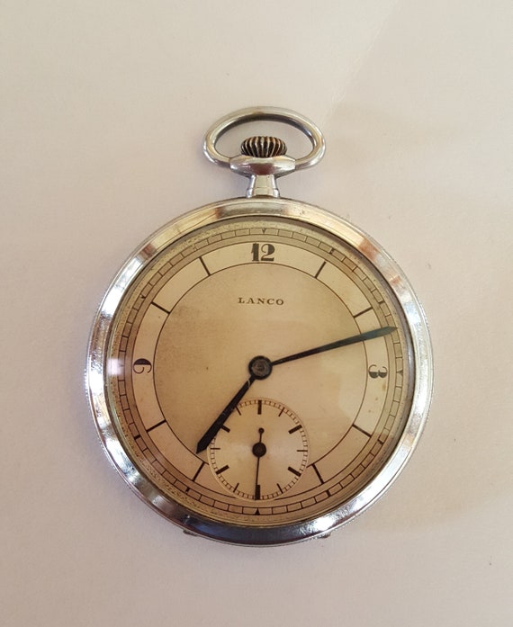 Reloj de bolsillo Lanco de 1950 estuche cromado que funciona diseno moderno delgado muy buen estado movimiento de 15 rubies joya hecho en Suiza Etsy Espana
