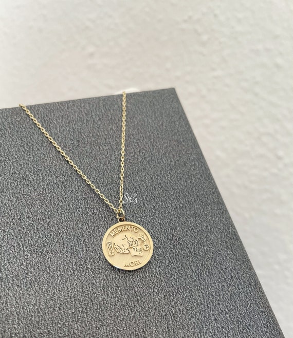 Memento mori pendant gold deals