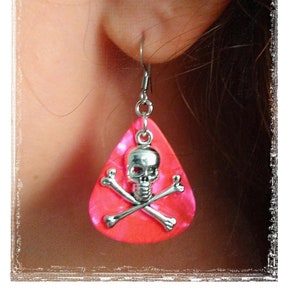 Guitar Pick earrings. Customize these with your favorite pick color and add a charm for an extra cost.