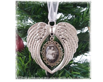 Photo memory ornament, beautiful angel wings customized with a photo or saying. Remember your loved one or special pet!