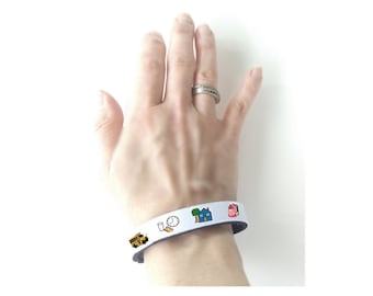 Visual communication aid, personalized fabric bracelet to help with communication.  Totally customized by you to fit your needs!