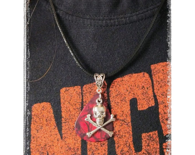 Guitar Pick Necklace. Customize these with your favorite pick color and add a charm for an extra cost.
