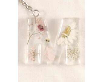 Custom clear resin letter keychain with dried flowers.  Makes a beautiful personalized gift!