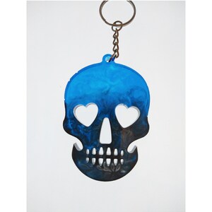 Personalized skull resin keychain, handmade and customized by you with many different colors and add-ins to make it uniquely yours!