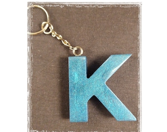 Personalized keychains, handmade resin letters customized by you with many different colors and effects to make it uniquely yours!