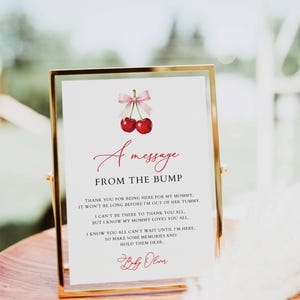 Un messaggio dal cartello Bump, baby shower con ciliegie per bambina, fiocco rosa e ciliegie