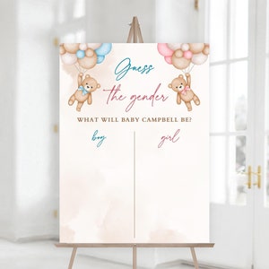 Peut inclure: Un panneau de révélation du sexe sur un chevalet. Le panneau présente le texte "Devinez le sexe" avec des ours en peluche tenant des ballons. Le panneau comprend également le texte "Quel sera le bébé Campbell ?" avec des espaces pour "garçon" et "fille".