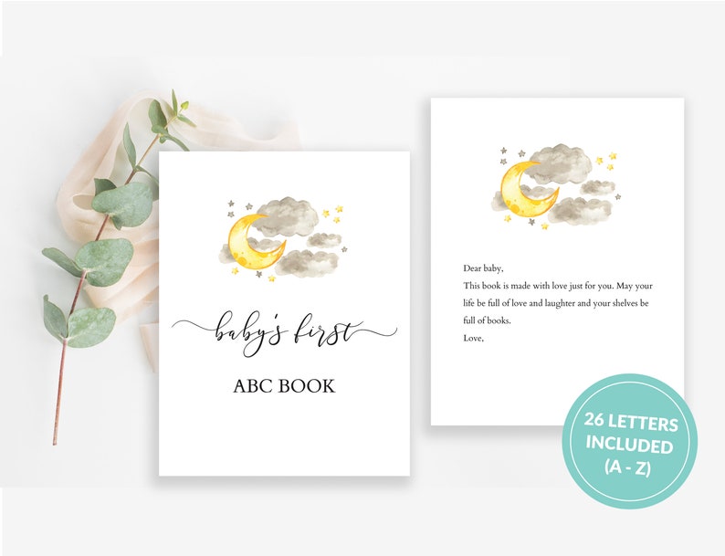 May include: A watercolour illustration of a yellow crescent moon and grey clouds with stars on a white background. The text "baby's first ABC BOOK" is written in black cursive script below the illustration. A separate card with the same illustration and text "Dear baby, This book is made with love just for you. May your life be full of love and laughter and your shelves be full of books. Love," is also shown. A blue circle with the text "26 LETTERS INCLUDED (A-Z)" is in the bottom right corner.