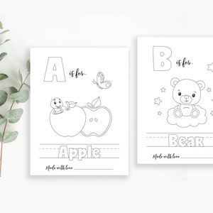 May include: Black and white printable coloring pages for kids featuring the letters A and B. The letter A is for apple and shows a worm in an apple. The letter B is for bear and shows a teddy bear sitting on a cloud. The text "Made with love" is included on both pages.