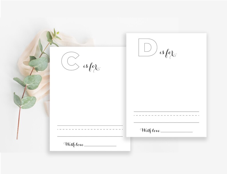 May include: Two printable alphabet cards featuring the letters C and D. Each card includes a space to write what the letter stands for and a line for a signature. The text on the cards reads "C is for..." and "D is for..." with the words "With love" at the bottom of each card.