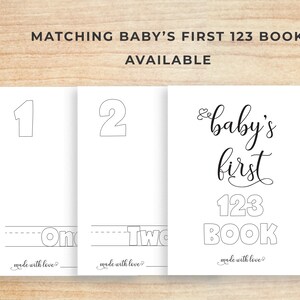 May include: A printable set of three pages for a baby's first 123 book. The pages feature the numbers 1 and 2 with the words "One" and "Two" written underneath. The third page has the text "baby's first 123 BOOK" with the words "made with love?" at the bottom of each page.