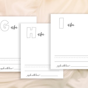 May include: Three printable alphabet cards with black outlines of the letters G, H, and I. Each card has the letter and the phrase "is for..." written in cursive. The cards have a dashed line for writing and the phrase "made with love?" at the bottom.
